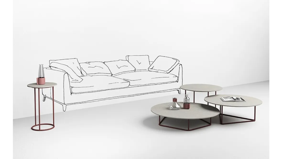Tavolini con top in cemento bianco Circus di Minotti Italia
