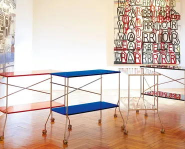 Tavolino Flip con piani in plexiglas e struttura in acciaio di Kartell