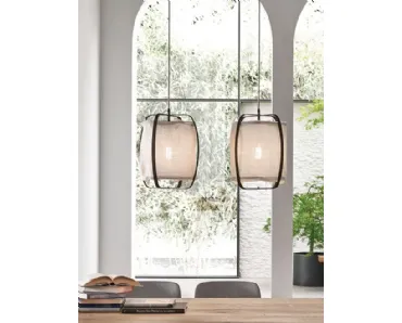 Lampada a sospensione in tessuto racchiusa in una gabbia di metallo Nuvola di Caos Creativo by Rossi&Co