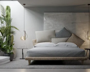 Letto con testiera decorativa e funzionale costituita da cuscini scomposti in tessuto imbottito Picabia di Bonaldo