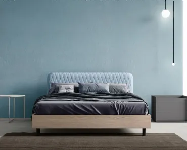 Letto Wing con testiera in tessuto trapuntato di Zalf