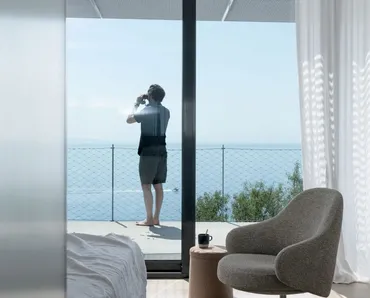 Poltroncina imbottita in tessuto Dua Relax di Kristalia