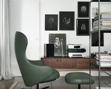 Poltrona in pelle morbida e confortevole con schienale alto e pouf appoggiapiedi Dua Relax Lounge di Kristalia