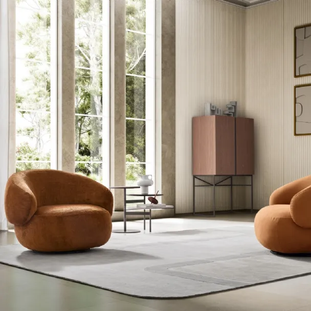 Poltroncina in tessuto dalle linee curve Pacific di Ditre Italia