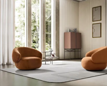 Poltroncina in tessuto dalle linee curve Pacific di Ditre Italia