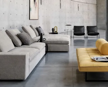 Divano in tessuto imbottito con doppia penisola Kubic di Desirèe