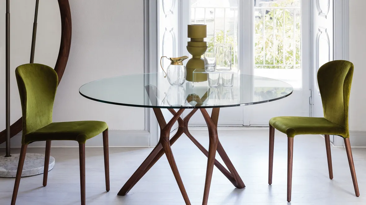 Tavolo rotondo in cristallo con base in legno massello Circe di Porada