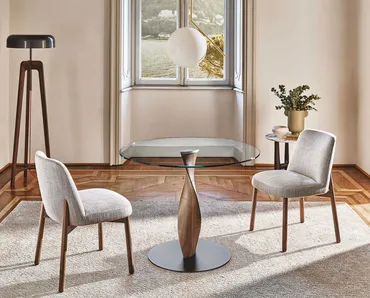 Tavolo rotondo con piano in cristallo e base in legno massello Spin di Porada