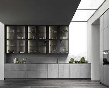 Cucina Moderna ME Materia in laminam Pietra di Savoia Grigia Bocciardata con pensili in vetro con telaio Brown di Meson's Cucine